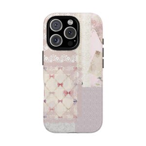 May include: A pink and white phone case with a patchwork design featuring bows, lace, and floral patterns.