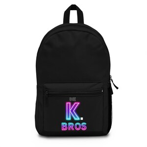 May include: Black backpack with a neon pink, blue, and purple graphic that says "DIE K. BROS".