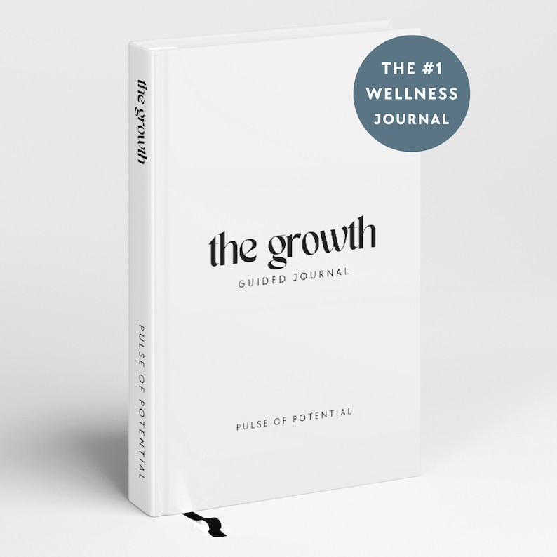 May include: A white journal with the text "the growth" and "GUIDED JOURNAL" in black. The text "PULSE OF POTENTIAL" is printed on the spine and bottom of the journal. A blue circle with the text "THE #1 WELLNESS JOURNAL" is in the top right corner.