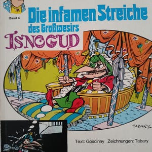 May include: Comic book cover featuring a cartoon illustration. The title "Die infamen Streiche des Großwesirs ISNOGUD" is prominently displayed in blue and purple. The artwork depicts a character in a turban and robes, seated in a chair. The cover includes text in German.