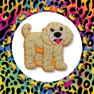 May include: A cream-coloured, cartoon-style dog with a brown nose and tongue sticking out. The dog is standing on a white background.