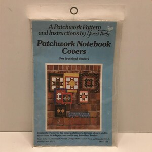 May include: A blue package containing a patchwork pattern and instructions for notebook covers. The cover features a brick wall background with images of patchwork designs. Text on the package reads "Patchwork Notebook Covers" and "Yours Truly."