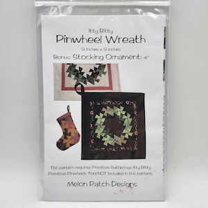 May include: A package featuring a sewing pattern for a pinwheel wreath, measuring 9 inches by 9 inches, with a bonus stocking ornament. The pattern includes a picture of the finished wreath and stocking. The text "Melon Patch Designs" is visible.