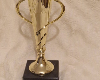 Personalised 20 cm multisport gold coloured spiral cup trophy on black marble base. Ideal for any sport or award.