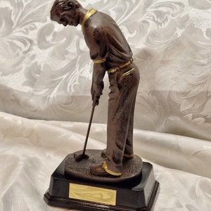 Personalised 22 cm putting golfer figurine. Ideal golf trophy, ornament, desk item or gift for a golf lover.