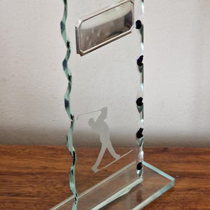 Personalised 18 cm optical glass golf trophy. Colour is hint of jade with blue trimming. Ideal golf award