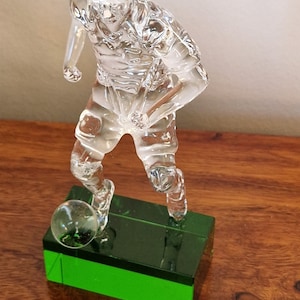 Personalised 15 cm optical and green coloured crystal footballer figurine. Ideal as GAA or soccer trophy, ornament or gift. Engraved free