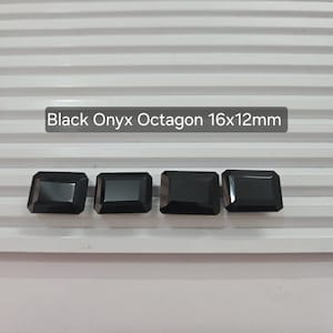 May include: Four black onyx octagon gemstones with a rectangular shape and beveled edges. The image text reads "Black Onyx Octagon 16x12mm". The gemstones measure approximately 16 x 12mm.