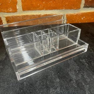 GUZZINI Lucite desk organizer designed by Fabio Manlio. Plexiglass desk organizer.