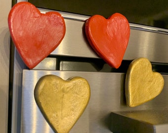 Magnetic hearts in gold and red, Valentine's hearts