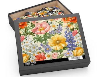 May include: A 16x20 inch puzzle box with a floral design. The box is open, revealing the puzzle pieces inside. The puzzle image features a colorful array of flowers, including pink, yellow, and blue blooms, set against a cream background.
