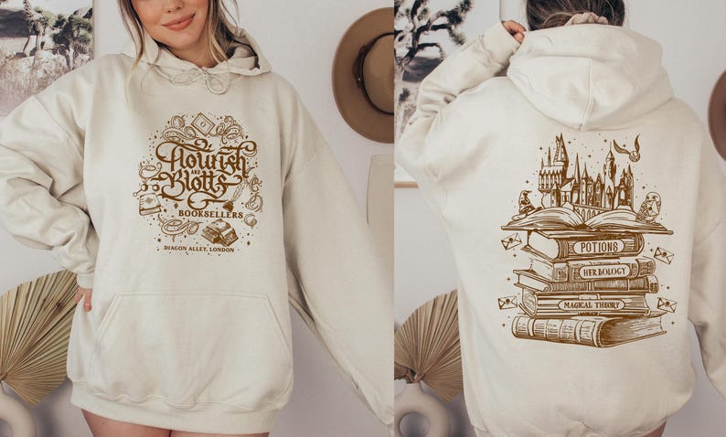 May include: A cream-colored hoodie with a brown graphic of the fictional bookstore "Flourish & Blotts" from the Harry Potter series. The text "Booksellers" is included in the graphic. The hoodie also features the text "Diagon Alley, London".