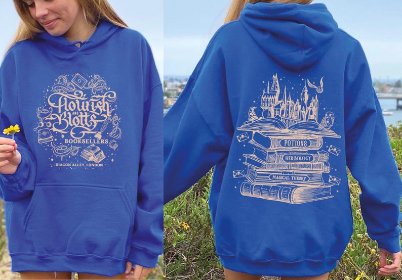 May include: A royal blue hoodie with a white graphic of a stack of books and the text "Flourish and Blotts Booksellers Diagon Alley, London".