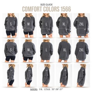 May include: Size guide for Comfort Colors 1566 sweatshirts. The image shows various sizes, including S, M, L, XL, and 2XL, with measurements in inches. The model is 5'8", 125LB, with measurements of 35"-28"-37".