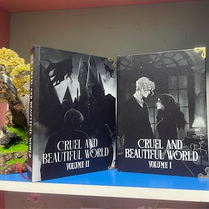 Cruel and beautiful World Book .  Hardcover Bookbinding. Full Series.2-Volume Hardcover Collection