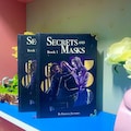 Secrets and MasKs Book .  Hardcover Bookbinding. Full Series.2-Volume Hardcover Collection product logo