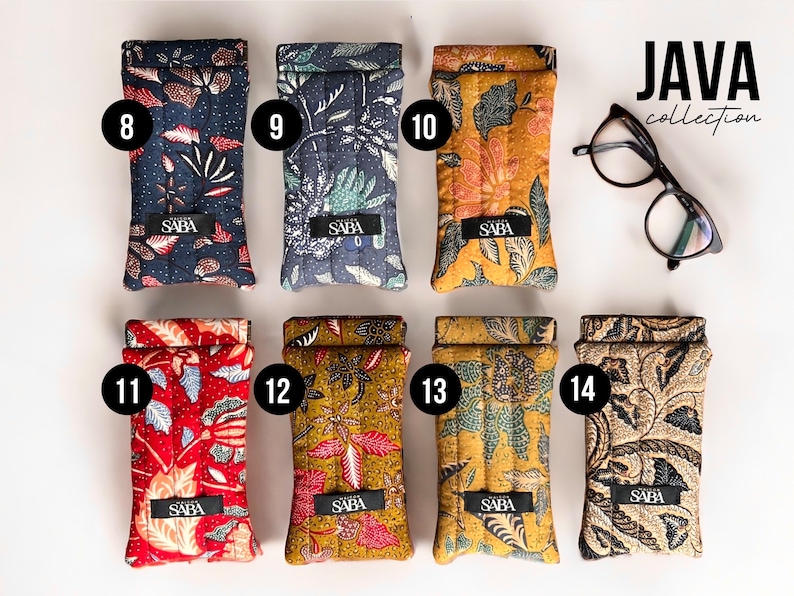 May include: Eight different patterned eyeglass cases with the word "SABA" printed on each. The cases are arranged in two rows of four. The cases are all made of fabric and have a quilted design. The word "JAVA collection" is printed in the top right corner of the image.