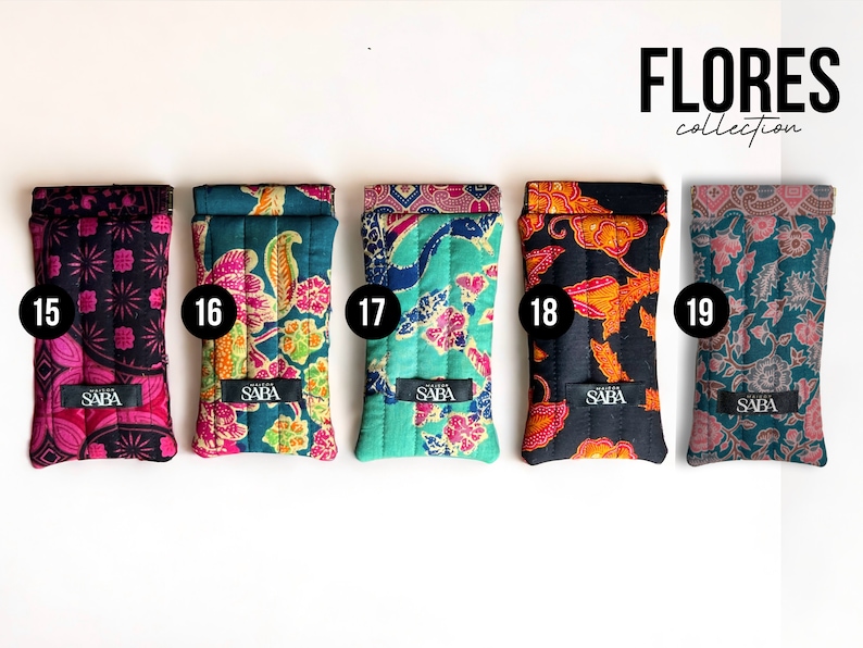 May include: Five quilted phone cases with different floral patterns. The cases are numbered 15 through 19 and have the word "SABA" printed on them. The cases are part of the "FLORES collection".