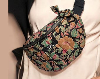 Black crossbody bag with floral motif, large quilted fanny pack in Bali batik fabric, floral waist bag