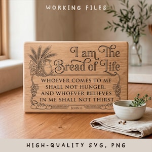 May include: A rectangular wooden sign with the text "I am The Bread of Life" in elegant script. The sign includes the quote "Whoever comes to me shall not hunger, and whoever believes in me shall not thirst." Decorative elements include wheat, grapes, and a jug.