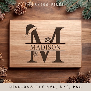 May include: A wooden cutting board with a Christmas theme. The letter "M" is prominently displayed, with "MADISON" below it. A Santa hat and snowflakes are incorporated into the design. The text "WORKING FILES" and "HIGH-QUALITY SVG, DXF, PNG" are also visible.