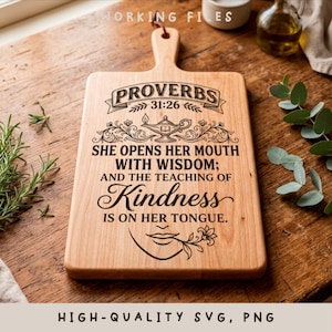 May include: A light-colored wooden cutting board with a handle. The board features engraved text from Proverbs 31:26, including the words "Wisdom" and "Kindness." Decorative elements include a lamp and floral accents. The words "HIGH-QUALITY SVG, PNG" are at the bottom.