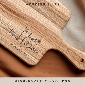 May include: Wooden chopping board with a handle, featuring the script "Bless this kitchen & all who gather here". The board displays a natural wood grain and a hanging hole. The text "WORKING FILES" and "HIGH-QUALITY SVG, PNG" are also visible.