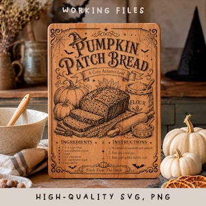 May include: A rectangular wooden cutting board engraved with the text Pumpkin Patch Bread, A Cozy Autumn Loaf, featuring illustrations of a loaf of bread, pumpkins, a flour sack, and a rolling pin, along with a printed recipe for pumpkin bread.