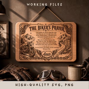 May include: A rectangular wooden wall sign featuring the engraved text THE BIKER'S PRAYER, a motorcycle illustration, mountain scenery, and a winding road. The design includes decorative wings, gears, and the word Amen, all suspended by a rope.