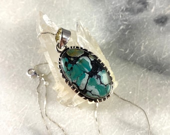 Handcrafted Turquoise Sterling Silver Pendant Necklace: Gemstone Jewelry