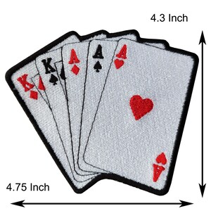 May include: A set of five embroidered iron-on patches featuring playing cards. The cards are a King of Spades, Ace of Spades, Ace of Clubs, Ace of Hearts, and Ace of Diamonds. The patches are 4.75 inches by 4.3 inches.