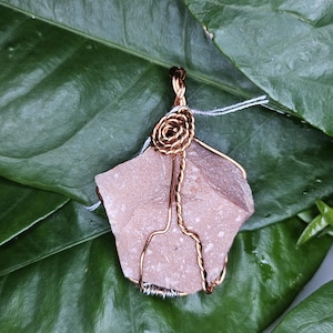 Handcrafted Red Rock Pentagon Pendant with Copper and Silver Wire Accents