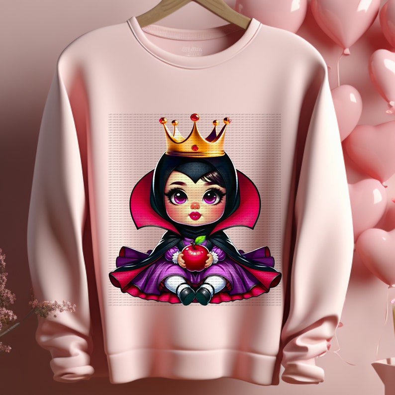 Peut inclure: Un sweat-shirt rose avec une image de dessin anim&eacute; d'une jeune fille habill&eacute;e en m&eacute;chante reine de Blanche-Neige. Elle porte une robe noire, une cape rouge, une couronne dor&eacute;e et tient une pomme rouge.