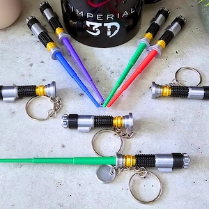 Retractable Lightsaber Keychain: 3D Printed Metallic Finish, Multiple Colors