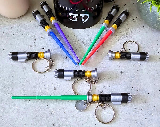 Lightsaber Keychain Retractable Blade | Mini Collapsible Expandable Blade | 3D Printed Three Color Metallic Finish | Multiple Blade Colors