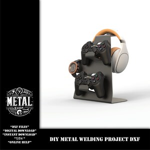May include: A DIY metal welding project DXF file for a stand to hold two video game controllers and a pair of headphones. The stand is made of metal and has a black finish. The controllers are black and the headphones are white with a brown headband.