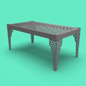 May include: A gray metal table with a geometric pattern cut out of the top and legs. The table is on a turquoise background.
