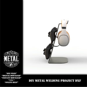 May include: A metal stand for holding two video game controllers and a pair of headphones. The stand is made of metal and has a black finish. The stand is designed to hold the controllers and headphones securely in place. The stand is a DIY project and the design files are available for download. "DXF FILES" "DIGITAL DOWNLOAD" "INSTANT DOWNLOAD" "7/24" "ONLINE HELP" DIY METAL WELDING PROJECT DXF