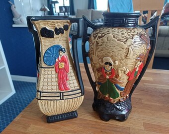 A pair of Cyples old pottery Embosa Ware vases