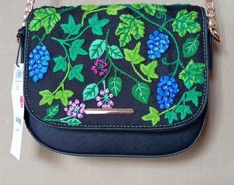 A Hand Embroidered Purse or Handbag with Floral Motifs