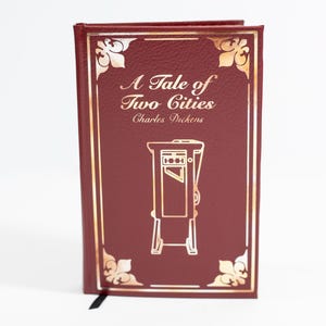 A Tale of Two Cities by Charles Dickens novel book re-bind