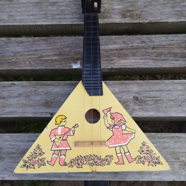 Baby balalaika. balalaika. Vintage balalaika. Musical balalaika. Musical instrument. Vintage of the USSR. Russian balalaika.