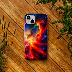 May include: A phone case with a colorful abstract design featuring swirling red, orange, and blue colors. The design resembles a nebula or galaxy.