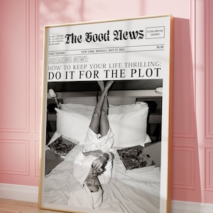 May include: A black and white newspaper with the headline "The Good News" and the subheading "Breaking News: How to Keep Your Life Thrilling: Do It For The Plot". The newspaper features a photo of a woman in a white robe lying on a bed with pizza boxes.