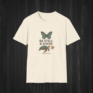 Be Still and Know T-Shirt – Christian Scripture, Butterfly Turtle Design Sand