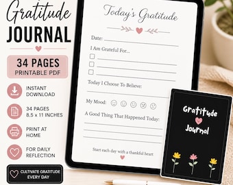 May include: A digital gratitude journal with a black cover and floral accents, alongside a tablet displaying daily prompts. The journal includes 34 pages, printable in PDF format, and measures 21.59 x 27.94 cm. The design promotes daily reflection and mindfulness.