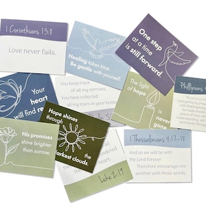 May include: A selection of square cards with uplifting quotes and line art illustrations. The cards are in various colours, including blue, green, and purple. Text includes phrases such as "Love never fails" and "One step at a time is still forward."