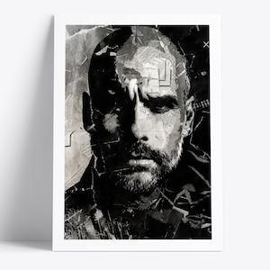 Könnte beinhalten: Schwarz-Weiß-Kunstdruck eines Porträts eines Mannes mit Bart. Das Kunstwerk ist eine Collage, wobei das Gesicht aus zerrissenem Papier und Zeitungspapier besteht. Der Druck ist in einem weißen Rahmen eingefasst.