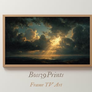 May include: A framed landscape print shows a dramatic sky with dark, billowing clouds and a brilliant burst of sunlight. The artwork, with warm and cool tones, is labeled "Boss39 Prints Frame TV Art."