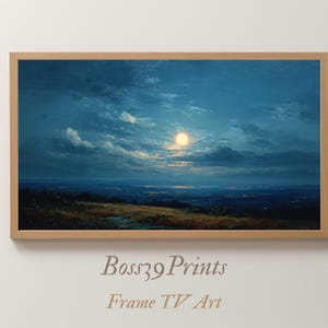 May include: A framed landscape painting of a moonlit night. The artwork shows a bright moon, a dark blue sky, and a landscape with a field and distant city lights. The frame is made of light-coloured wood. The text "Boss39 Prints Frame TV Art" is at the bottom.